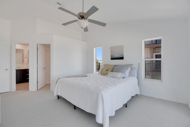 2749 S Ponte Vedra Blvd, Ponte Vedra Beach, FL 32082 - bedroom with light colored carpet, ceiling fan, connected bathroom, and a high ceiling