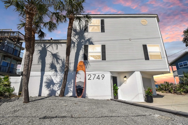 2749 S Ponte Vedra Blvd, Ponte Vedra Beach, FL 32082 - view of front facade with an attached garage and driveway