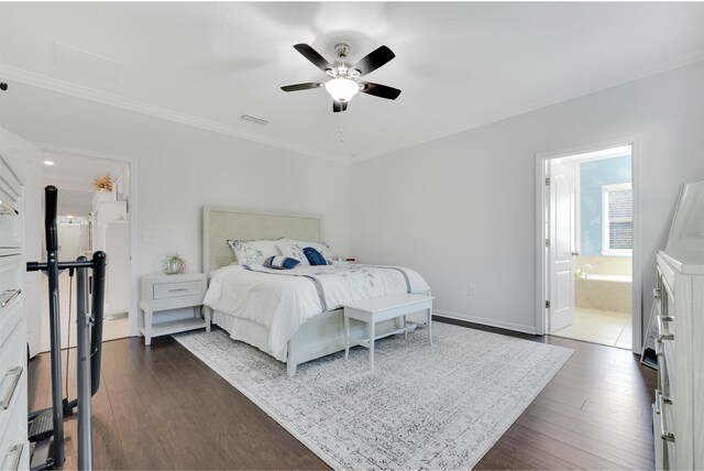 bedroom featuring dark wood-style floors, visible vents, crown molding, and baseboards