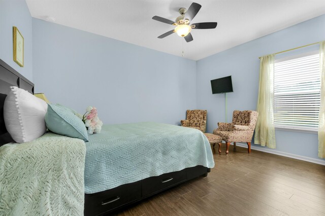 office space featuring ceiling fan, wood finished floors, visible vents, ornamental molding, and french doors