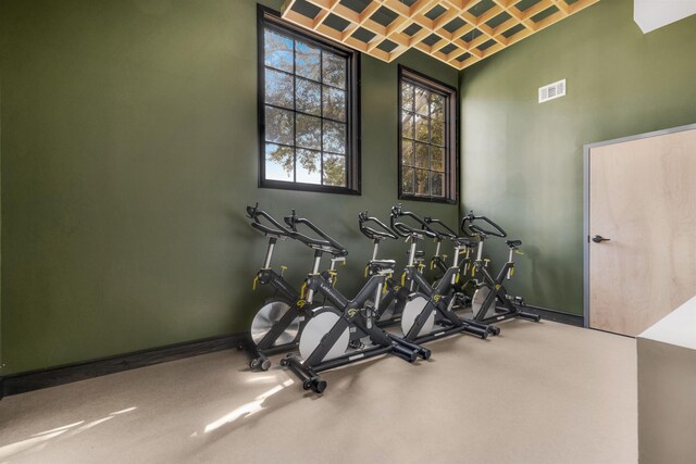 workout area with visible vents and baseboards