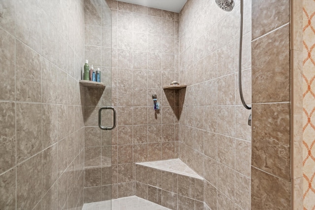 bathroom featuring an enclosed shower