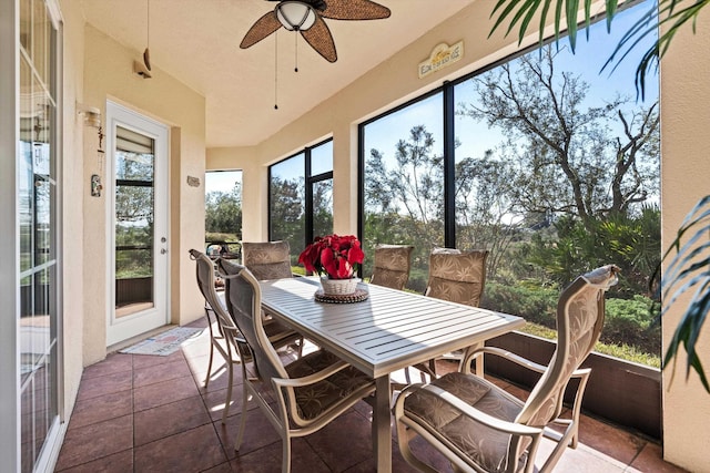 sunroom / solarium with ceiling fan