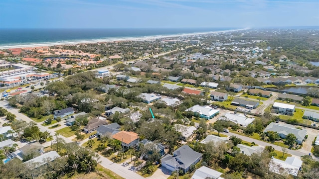 birds eye view of property featuring a residential view and a water view