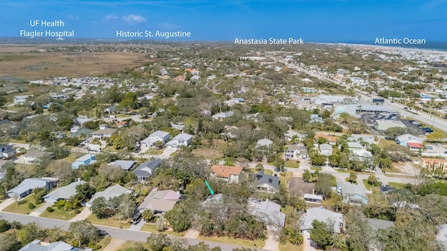 birds eye view of property with a residential view