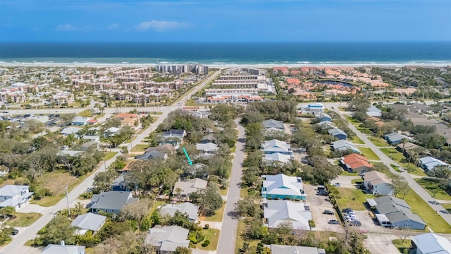 drone / aerial view featuring a residential view and a water view