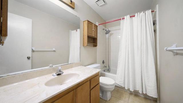 full bathroom featuring shower / bath combo with shower curtain, tile patterned flooring, vanity, and toilet