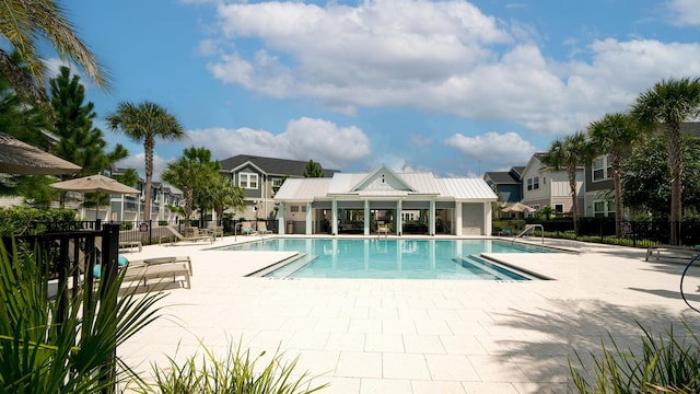 view of pool featuring a patio