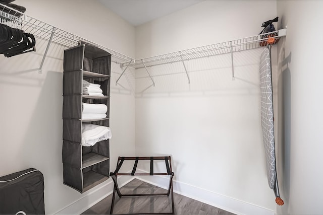 spacious closet featuring hardwood / wood-style flooring