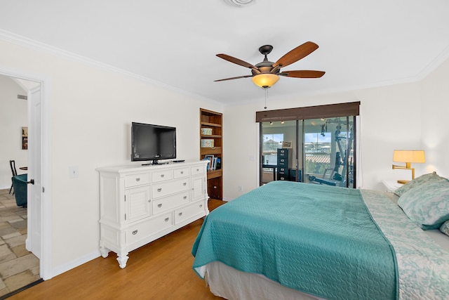 bedroom with ceiling fan, access to exterior, ornamental molding, and hardwood / wood-style floors