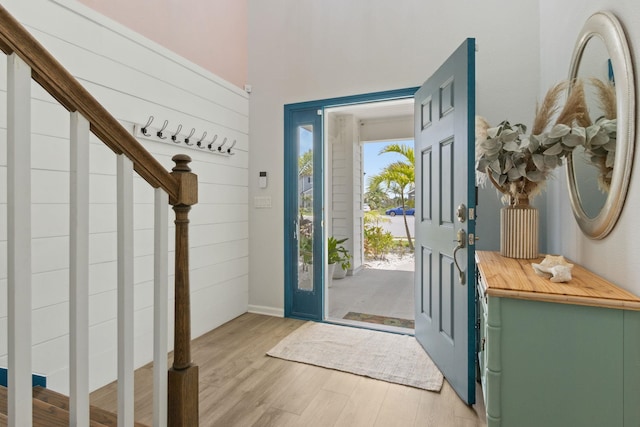 57 Guanahani Trl, Saint Augustine, FL 32080 - foyer entrance with light wood-style floors and stairway