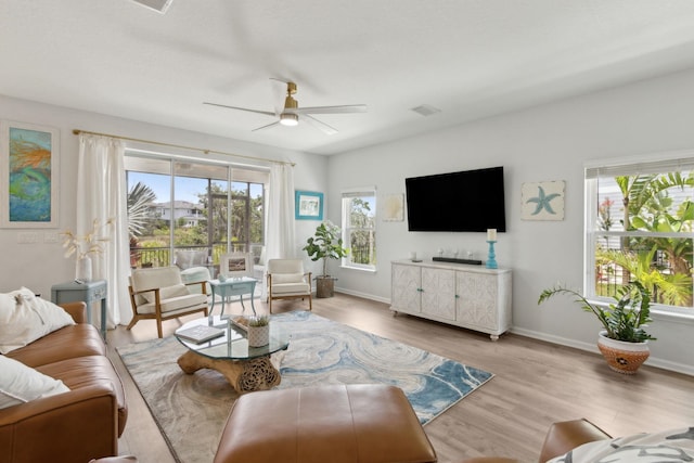 57 Guanahani Trl, Saint Augustine, FL 32080 - living area with a ceiling fan and wood finished floors