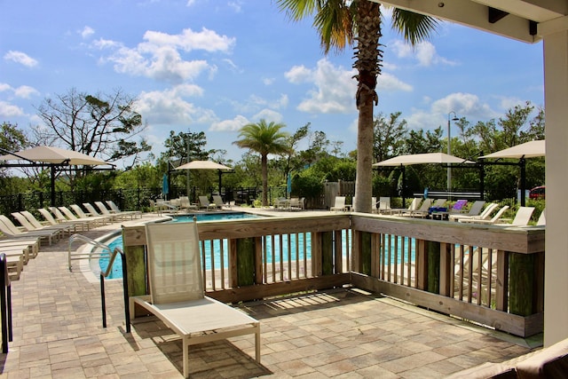57 Guanahani Trl, Saint Augustine, FL 32080 - community pool with a patio