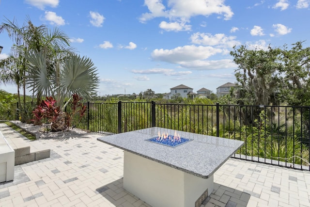 57 Guanahani Trl, Saint Augustine, FL 32080 - view of patio / terrace featuring an outdoor fire pit