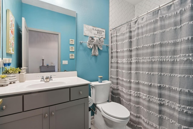 57 Guanahani Trl, Saint Augustine, FL 32080 - full bath featuring vanity, a textured wall, and a shower with curtain