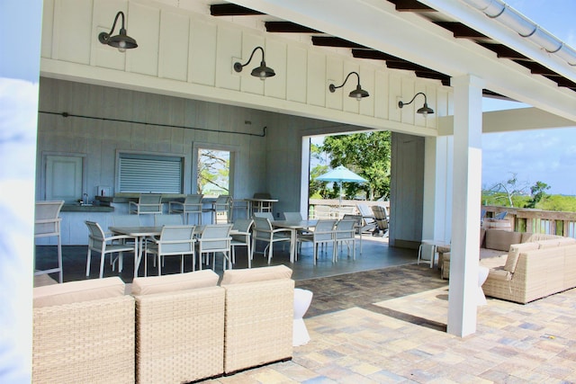 57 Guanahani Trl, Saint Augustine, FL 32080 - living area with brick patterned floors, wooden walls, and a towering ceiling