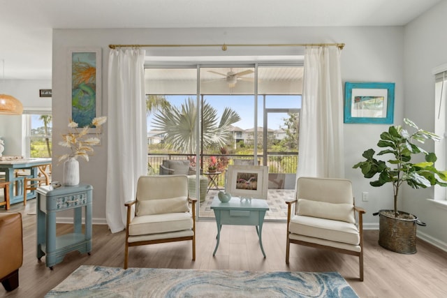 57 Guanahani Trl, Saint Augustine, FL 32080 - living area featuring plenty of natural light, wood finished floors, and ceiling fan