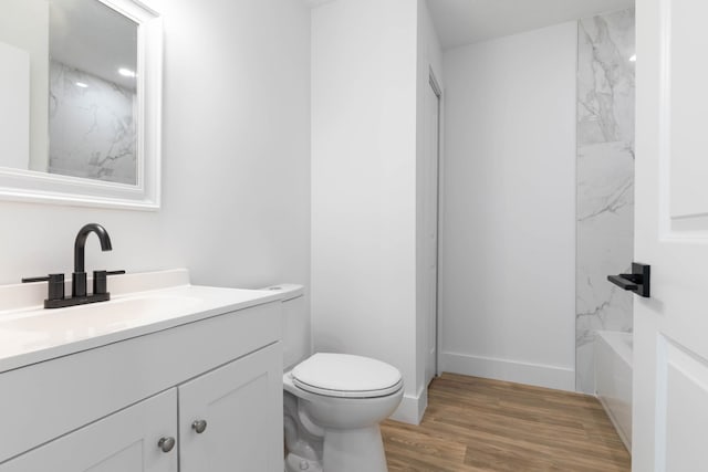 441 S Woodlawn St, Saint Augustine, FL 32084 - full bathroom featuring vanity and wood finished floors