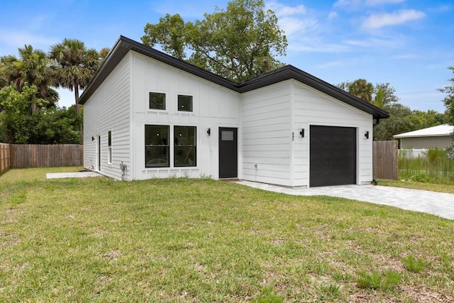 441 S Woodlawn St, Saint Augustine, FL 32084 - modern inspired farmhouse featuring a garage, decorative driveway, and board and batten siding