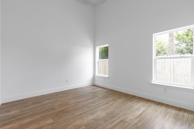 441 S Woodlawn St, Saint Augustine, FL 32084 - empty room with baseboards and wood finished floors