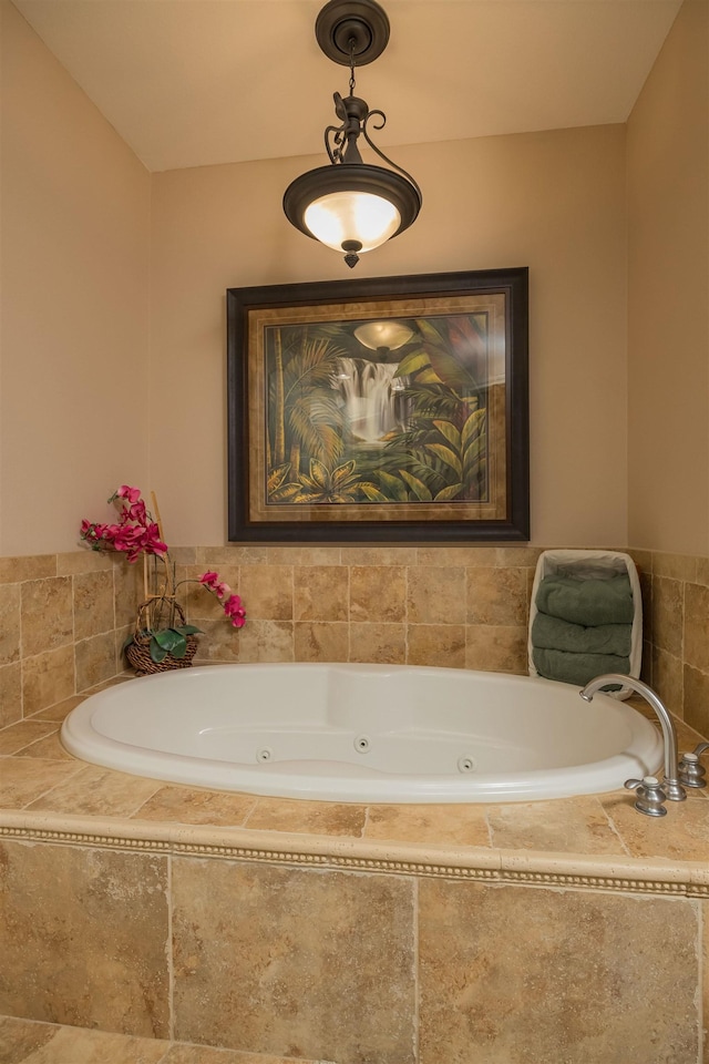 bathroom with a relaxing tiled tub