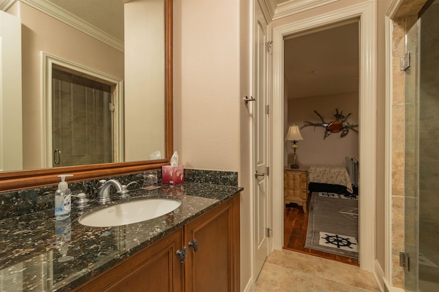 bathroom featuring tile patterned floors, crown molding, a textured ceiling, vanity, and a shower with shower door