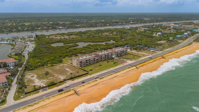 aerial view with a beach view and a water view