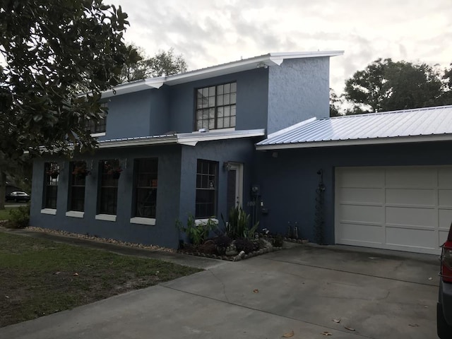 view of front of house with a garage