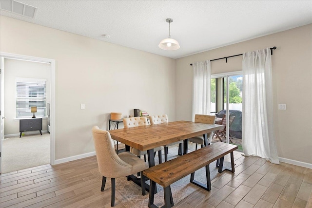 34 Anguilla Blvd, Saint Augustine, FL 32092 - dining area featuring light wood-type flooring and baseboards