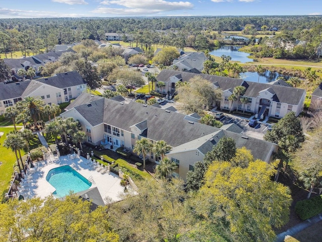 aerial view featuring a residential view and a water view