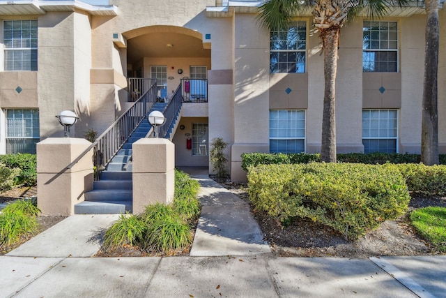 view of property with stairway