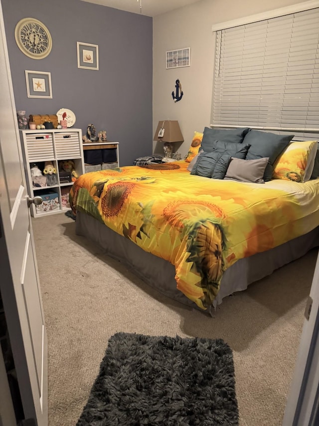 bedroom featuring carpet flooring