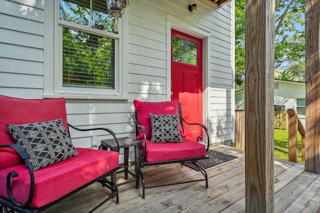 wooden deck featuring fence