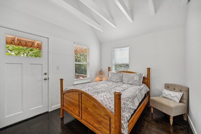 bedroom featuring lofted ceiling with beams and dark hardwood / wood-style floors