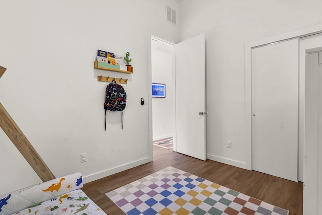 2470 Oleander St, Saint Augustine, FL 32080 - bedroom featuring wood finished floors and a closet