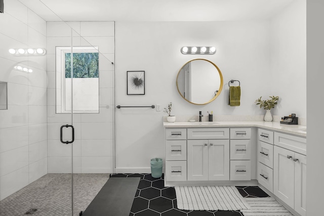 2470 Oleander St, Saint Augustine, FL 32080 - full bath featuring tile patterned flooring, vanity, and a shower stall