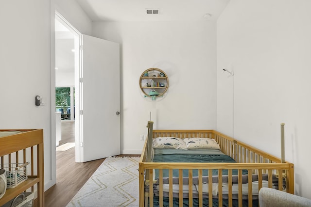2470 Oleander St, Saint Augustine, FL 32080 - bedroom with wood finished floors