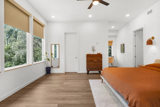 2470 Oleander St, Saint Augustine, FL 32080 - bedroom with multiple windows, recessed lighting, wood finished floors, and a ceiling fan