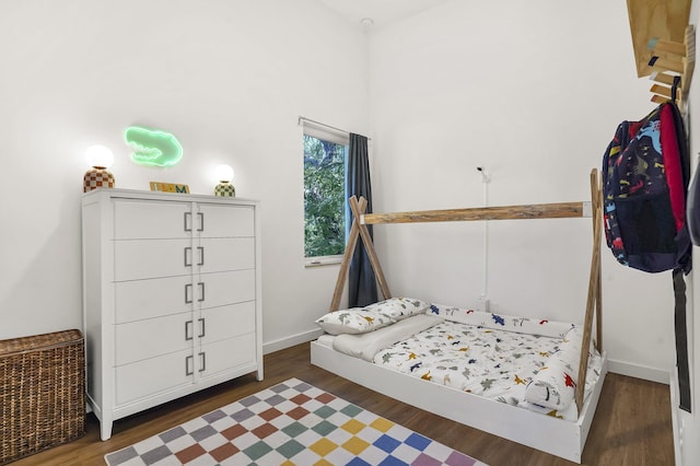 2470 Oleander St, Saint Augustine, FL 32080 - bedroom with wood finished floors and baseboards
