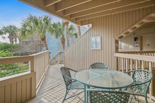 130 Ocean Hibiscus Dr Unit H 204, Saint Augustine, FL 32080 - wooden terrace with outdoor dining area