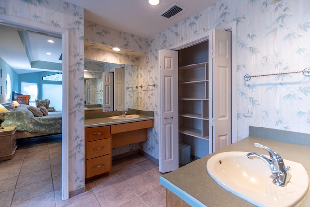 bathroom with vanity and tile patterned floors