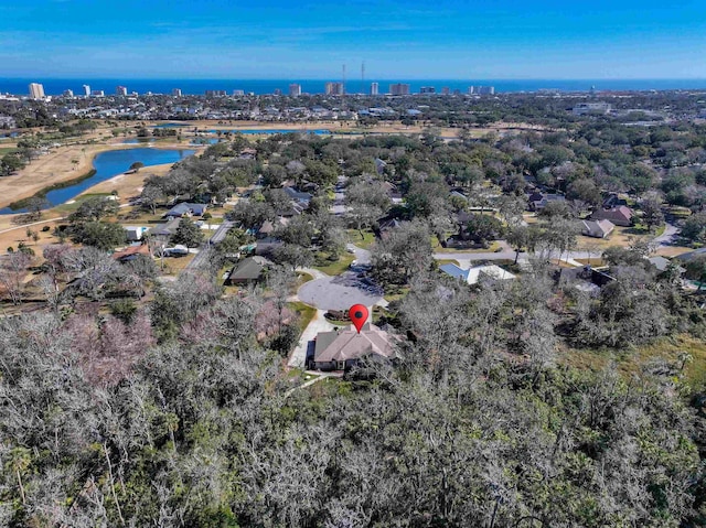 drone / aerial view with a water view