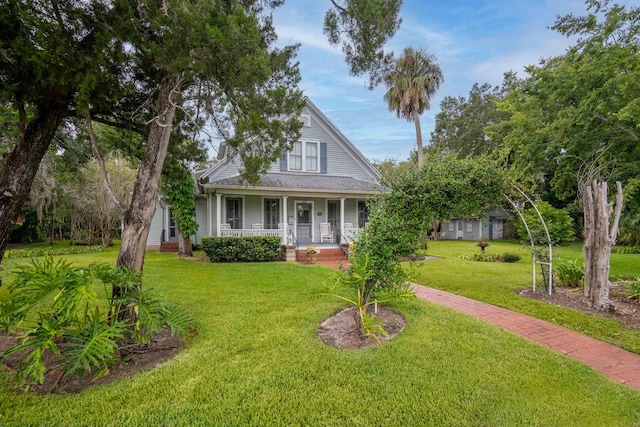 view of front facade with a porch and a front yard