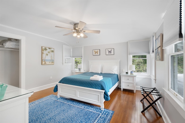 bedroom featuring ceiling fan and wood-type flooring