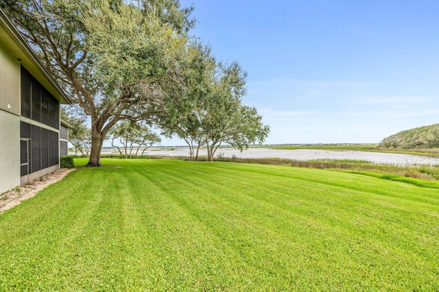 view of yard featuring a water view