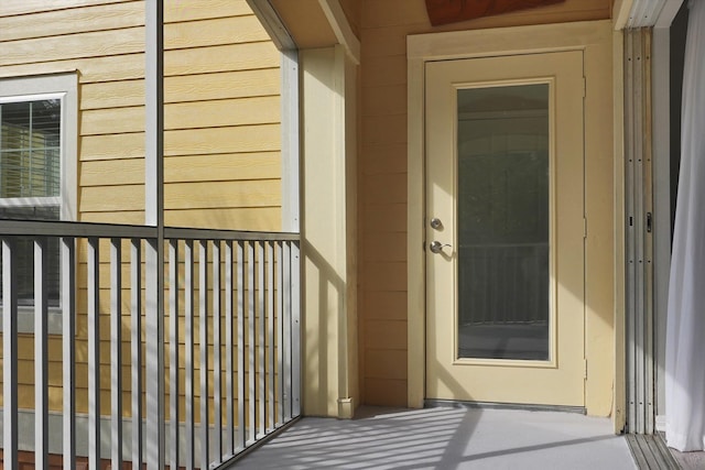 doorway to property with a balcony