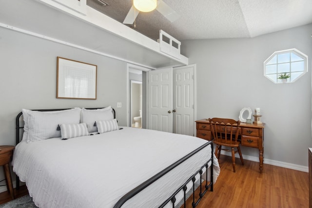 133 Pomar St, Saint Augustine, FL 32084 - bedroom featuring light wood-style flooring, a ceiling fan, and a textured ceiling