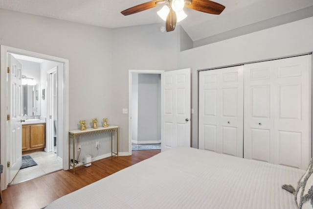 133 Pomar St, Saint Augustine, FL 32084 - bedroom featuring vaulted ceiling, light wood finished floors, a closet, ceiling fan, and connected bathroom