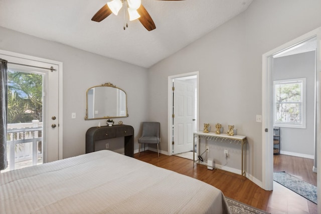 133 Pomar St, Saint Augustine, FL 32084 - bedroom with multiple windows, vaulted ceiling, wood finished floors, access to outside, and ceiling fan