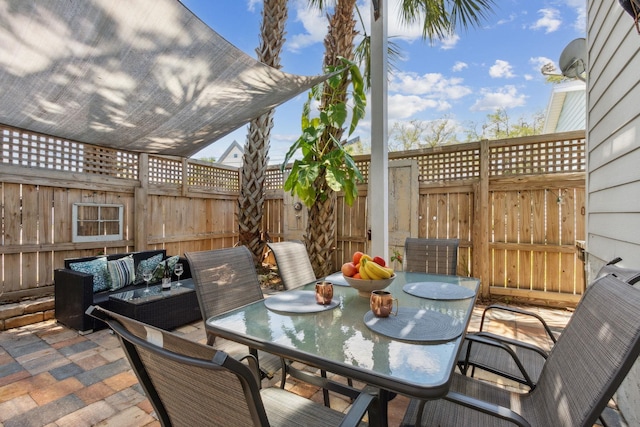 133 Pomar St, Saint Augustine, FL 32084 - view of patio / terrace featuring outdoor dining area and an outdoor living space